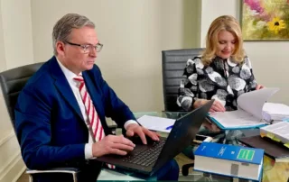 personal injury lawyers richard and brenda in office