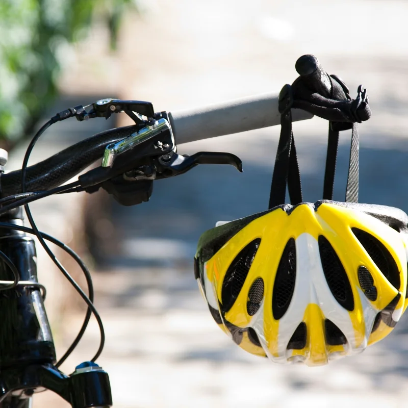 Bicycle With A Yellow Helmet Square